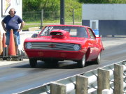 Red 1969 CAMARO Launching